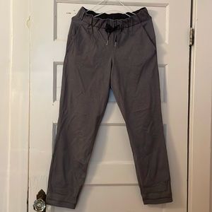 The favourite Lululemon On the Fly pant! Size 4 in heathered graphite grey.